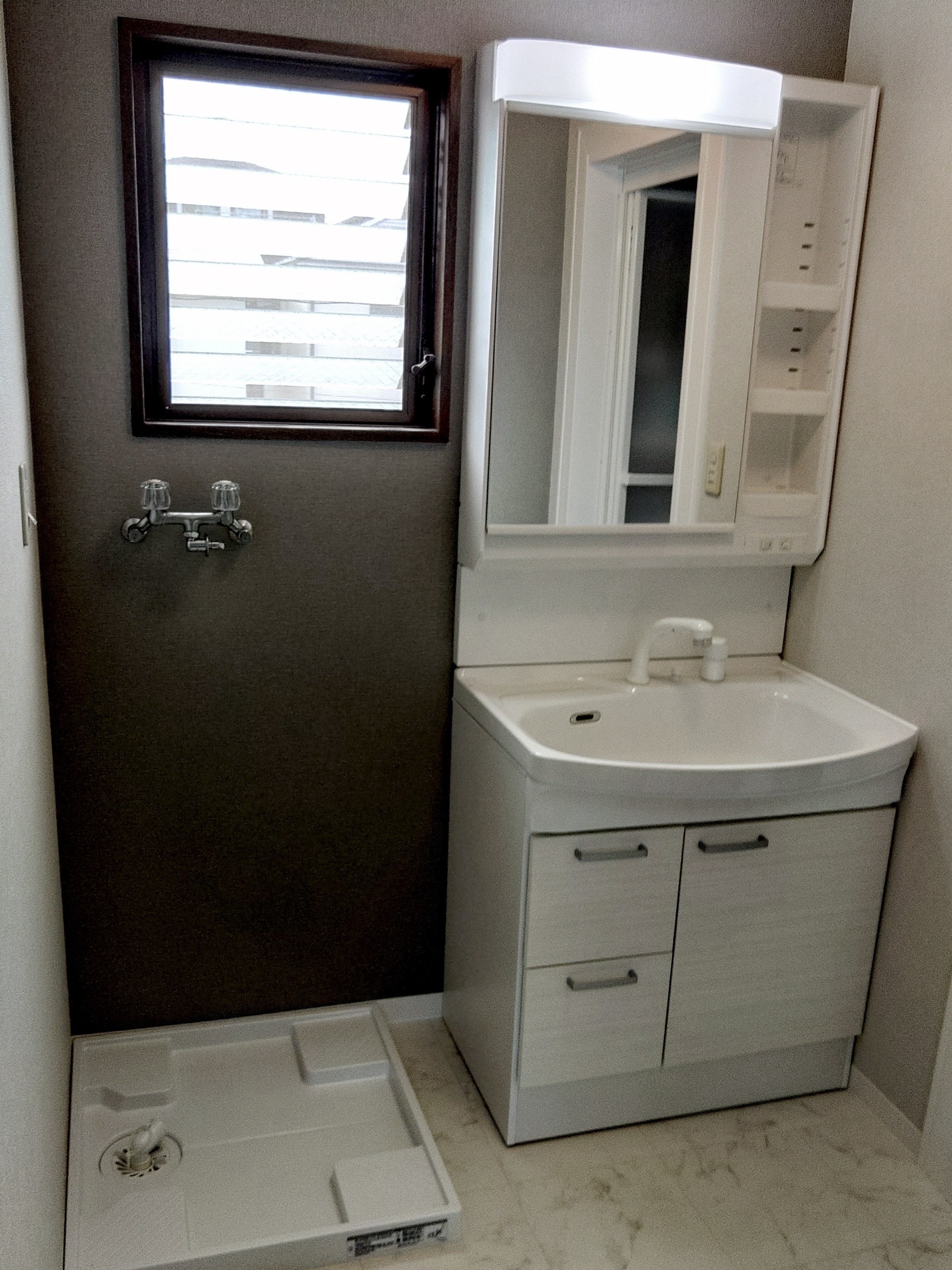 S様邸洗面化粧台交換後